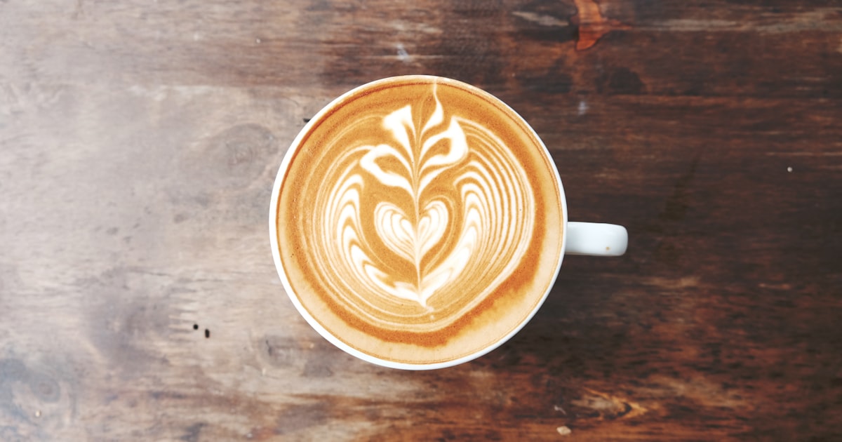 A cup of coffee in a white ceramic mug