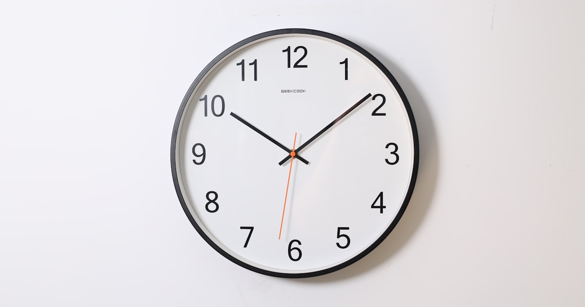 A round analog wall clock