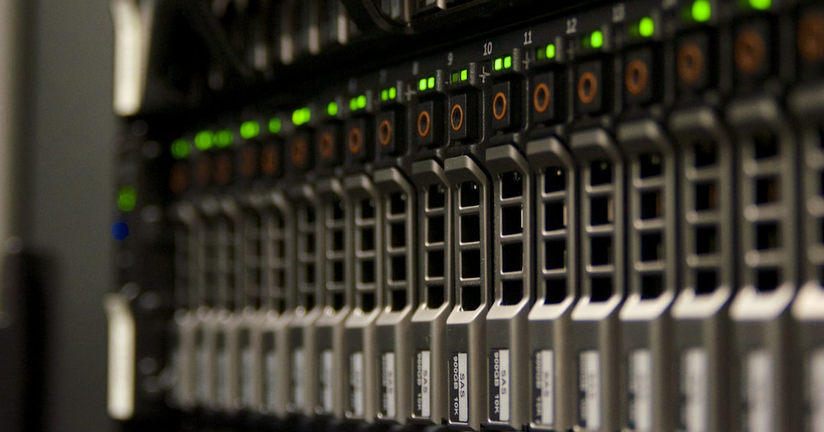 A server rack with blinking green lights