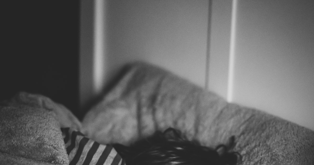 Child sleeping peacefully in bed